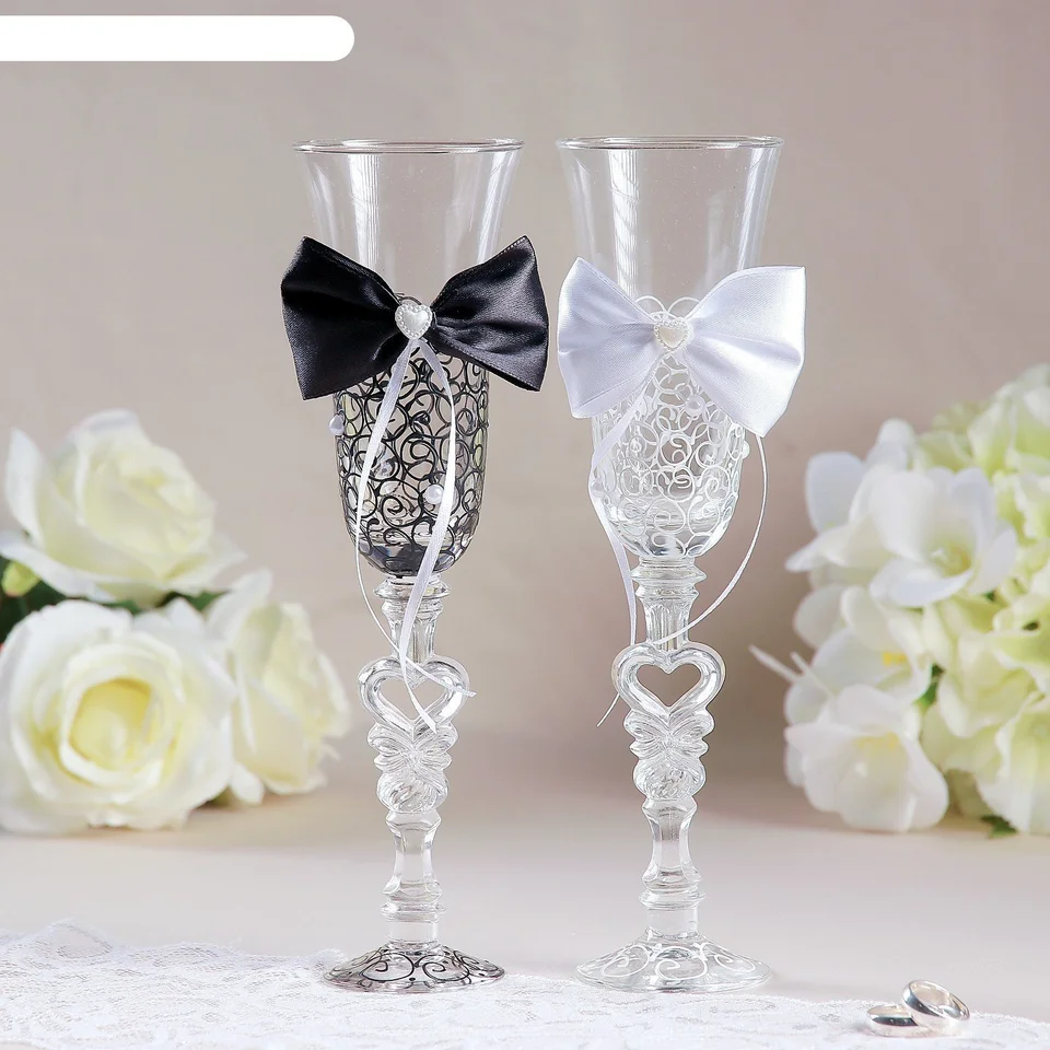 Украшение бокалов и шампанского на свадьбу